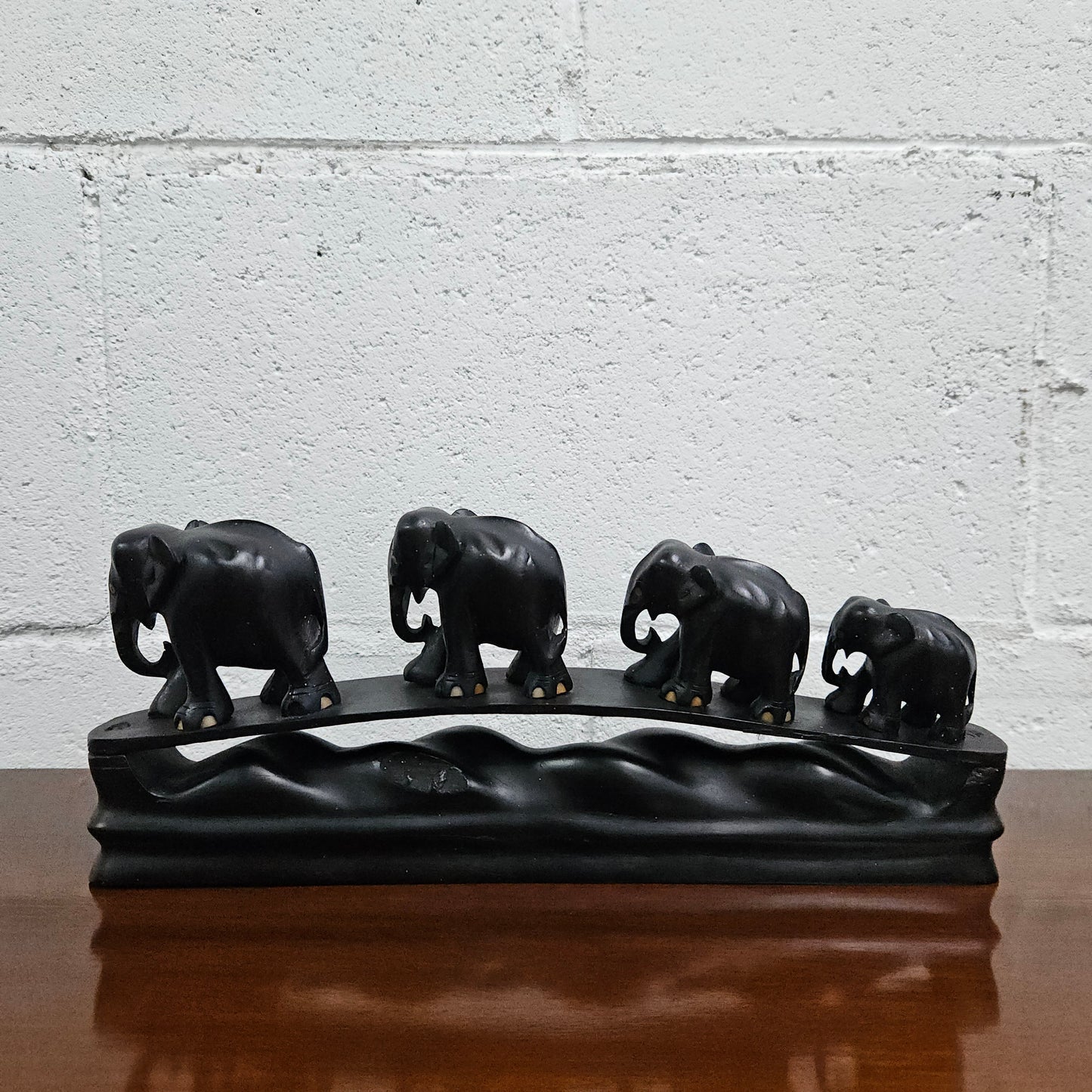 Vintage Ebony Walking Elephants Statue