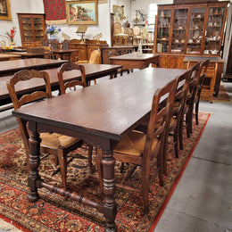 An Australian Silky Oak Spanish style refectory dining table measuring 274.5 cm in length. It can comfortable sit 8-10 people and is a very hard to find size. It is in good original detailed condition.