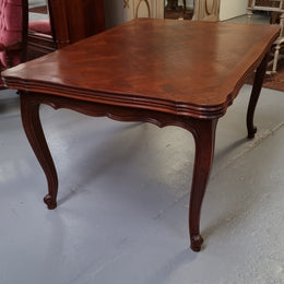 Beautiful French Oak Louis XV style parquetry top extension table. When fully extended the tables length is 239 cm. It is in good original detailed condition.