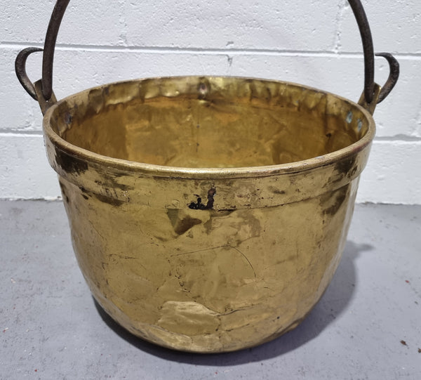 Antique French brass firewood handled bucket. In good original detailed condition.