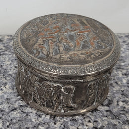 Unusual Antique silver over pottery Italian trinket box nicely decorated with Cherubs. It is in good original condition, please view photos as they help form part of the description.