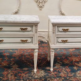 Attractive pair of Vintage French Louis 16th style two drawer marble topped bedsides. They have been sourced from France and are in good original condition.