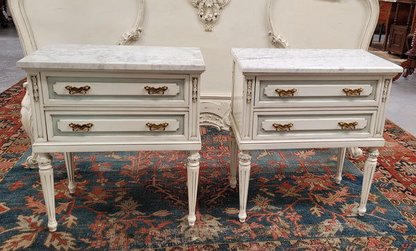 Attractive pair of Vintage French Louis 16th style two drawer marble topped bedsides. They have been sourced from France and are in good original condition.