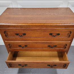 French Louis 15th style Oak three drawer chest of drawers with wooden top. It has been sourced from France and is in good original detailed condition.