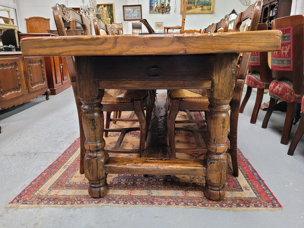 Large impressive 19th century 2.5 meter Antique French Oak farmhouse table. Loads of character with a stunning solid thick top and has a long drawer at one end. Sourced from France and in good original detailed condition.