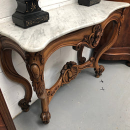 19th Century Louis XV style beautifully carved console table. With detailed ornate carving and a beautiful marble top. In good original detailed condition.