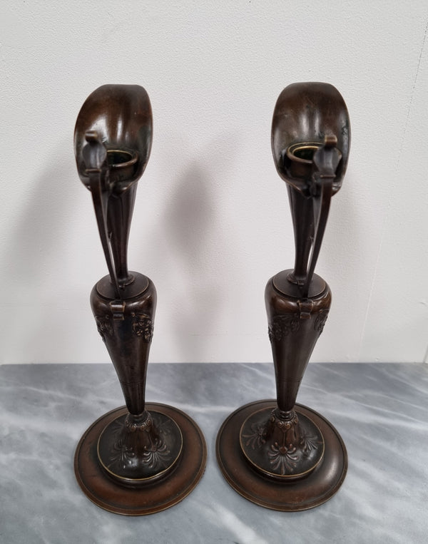 A stunning pair of French Art Nouveau bronze candlesticks. They are of fine quality and in very good condition.