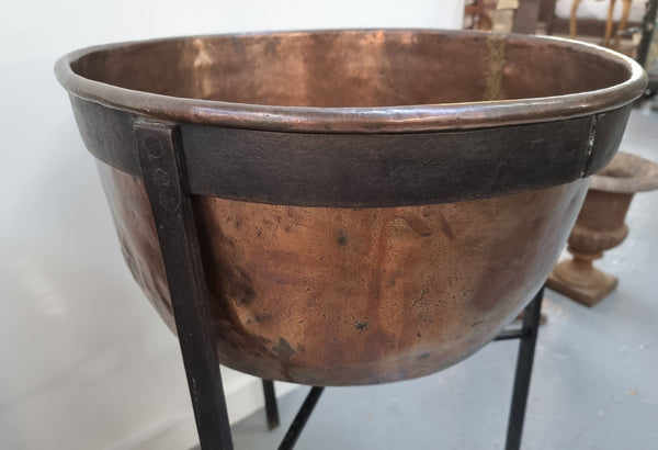 Fabulous Antique French copper pot on a solid iron stand in good original detailed condition. see photo for full description of condition.