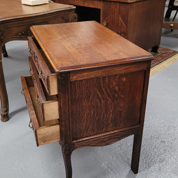 Rustic Louis XV style Oak petite three drawer chest featuring attractive carvings. It has been sourced locally and it is in good original detailed condition.