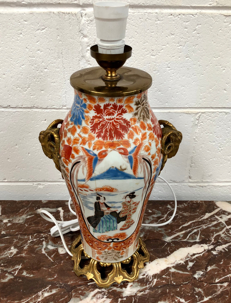 Stunning Japanese Imari style base with detailed french ormolu mounts. It is in good original working condition.