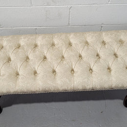 Vintage neutral upholstered buttoned stool. Fabric is in good used condition, please view photo's has they help form the description. The stool its self is in good condition.