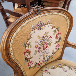 Louis XV style Walnut and tapestry armchair. Very comfortable to sit in and tapestry is in good original used condition.