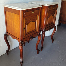 Pair of Louis XV style Walnut bedside cabinets marble top. Circa 1900 and in good original detailed condition.