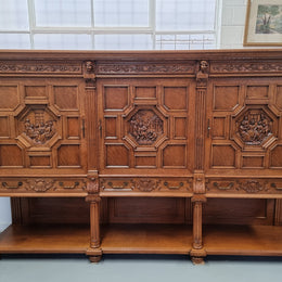 Impressive and grand French Oak Renaissance style sideboard. Beautifully detailed carvings and plenty of storage with three very large cupboards with a total of eight adjustable shelves along with three large drawers. It has been sourced from France and is in very good original detailed condition.