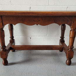 Small French Oak rustic coffee table. Perfect size for a small area and it is in good original detailed condition.