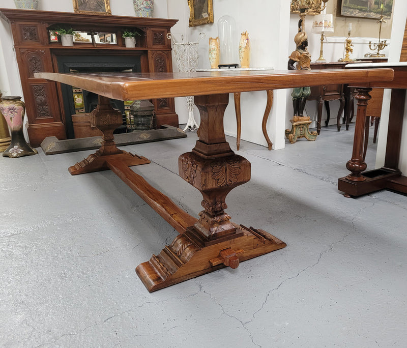 French style reclaimed Elm Farmhouse table with stretcher base and amazing carving underneath. Table can sit 10-12 people and is in good original detailed condition.