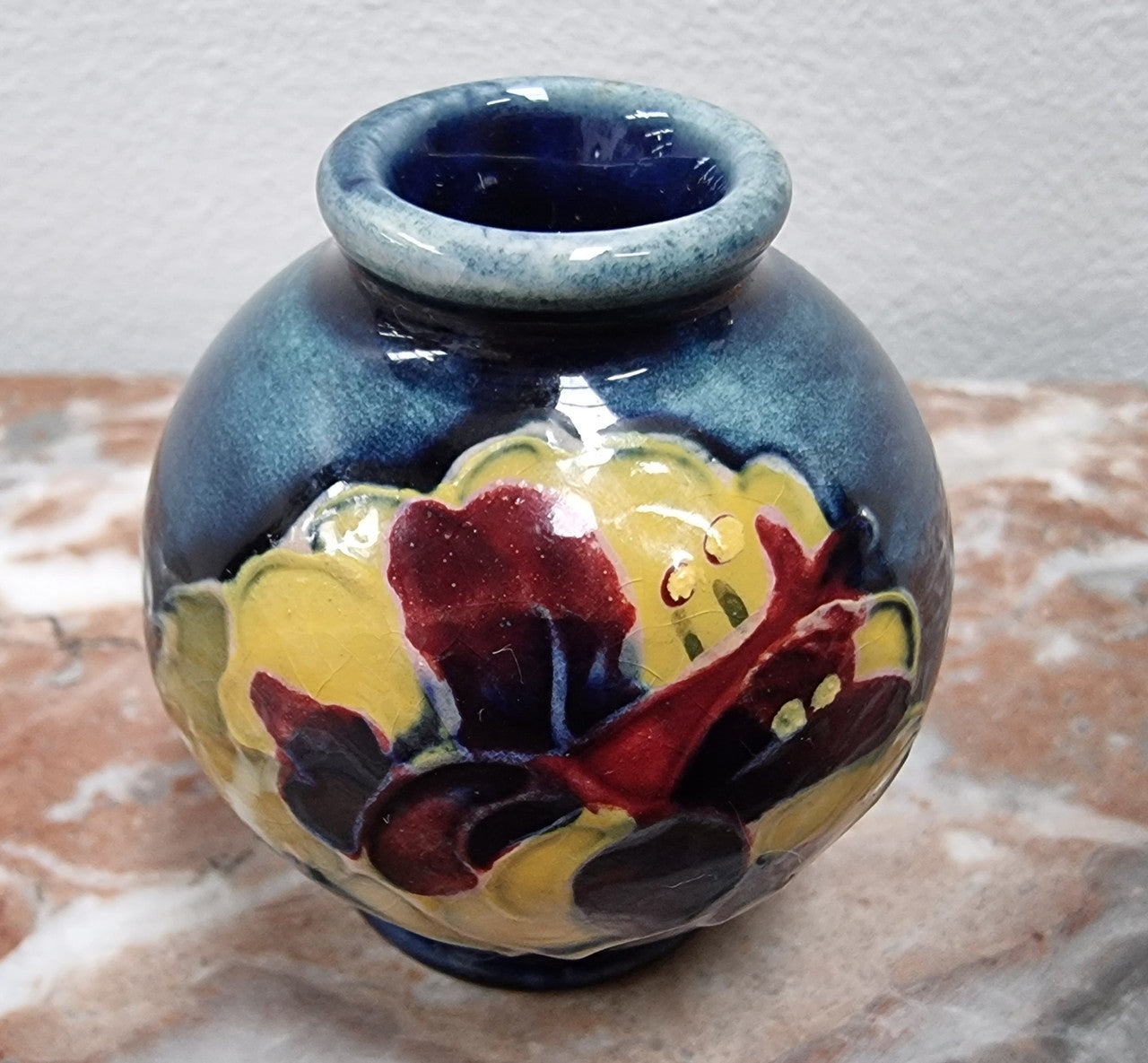 Rare Miniature Moorcroft vase with very vibrant and is in good original condition