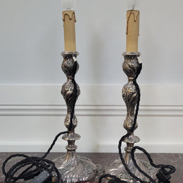 Pair of Antique French Silver candlestick table lamps with new wiring. In good original condition.
