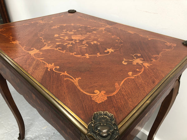 Beautiful french inlaid games table which includes internal drawers and bronze mounts. Internal drawers have counters and cards included.