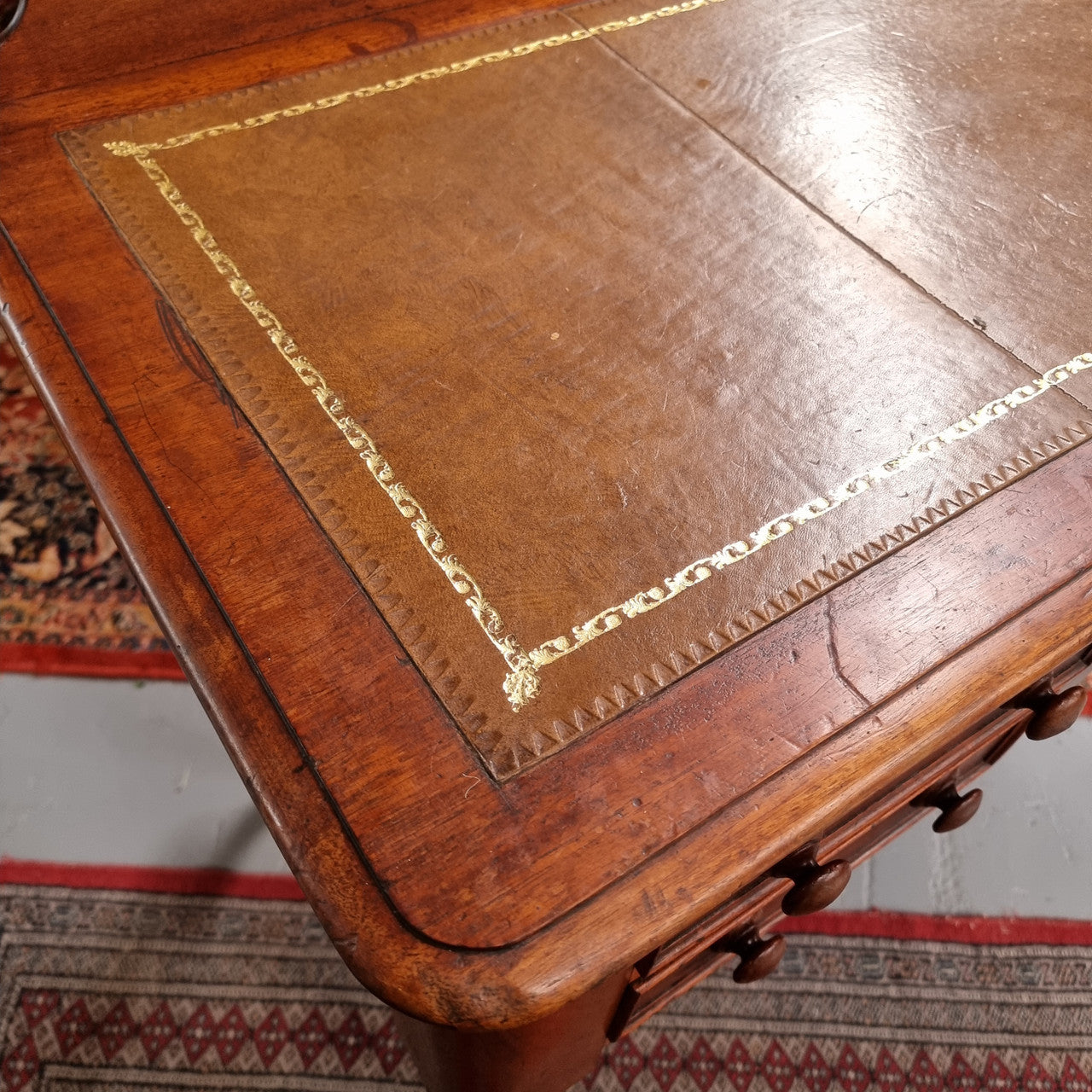 Lovely Victorian Cedar leather tooled  top desk, with five drawers on castors and of pleasing proportions. In very good original detailed condition and has been sourced locally.