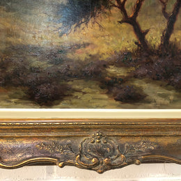 Sensational "Moody" oil on canvas landscape painting in a ornate gilt frame. In good original condition.