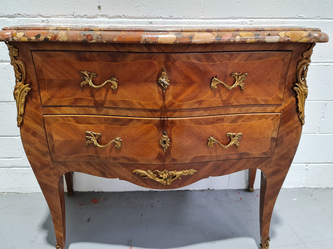 High quality French Mahogany Louis XVth style marble top commode. It has an eye catching marble top and is signed on body "J Bamelis". In very good original detailed condition.