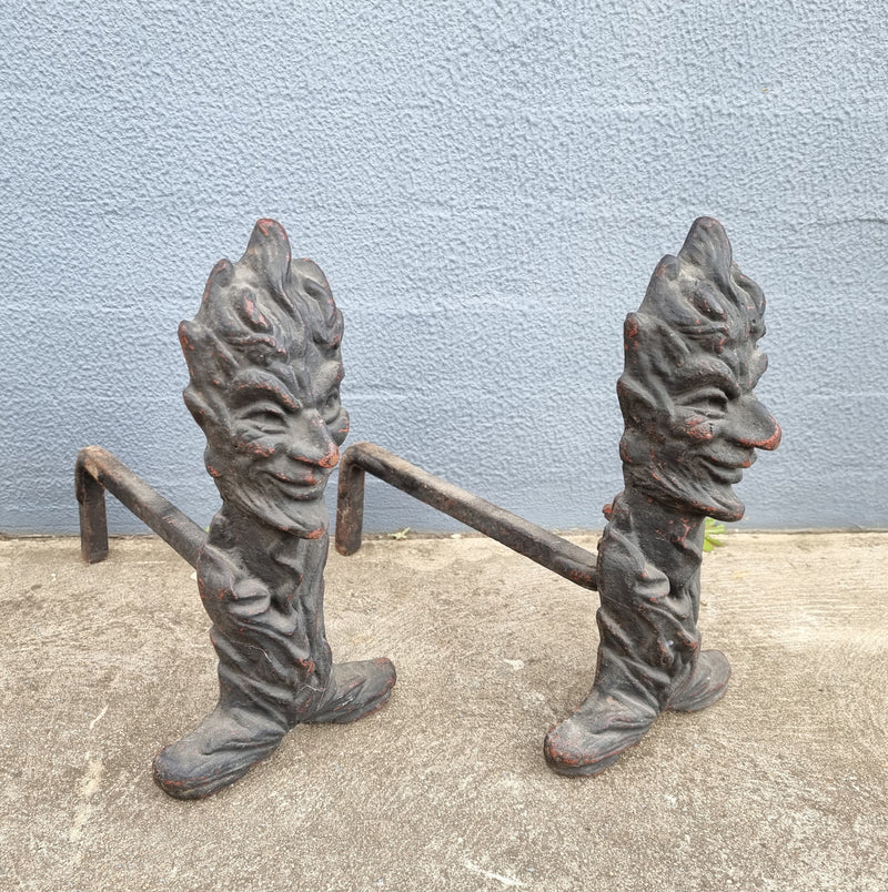 Fabulous rustic pair of French cast iron fire dogs. They are in good original condition.