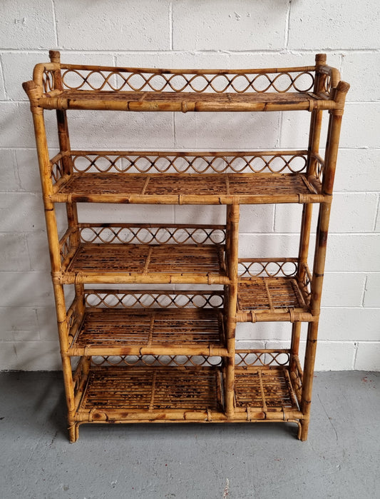 Vintage Tortoiseshell Bamboo Shelves.  Good size unit with irregular shelves. It is in good original condition and it very solid.