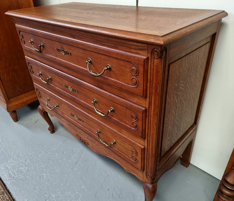 French Provincial Oak chest of three drawers. In good original detailed condition.