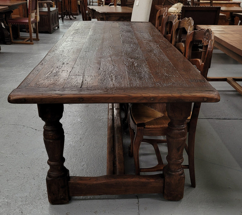Amazing 2.65 meter French Elm Refectory dining table with loads of rustic charm. This table has been sourced from France and can comfortably seat ten people. It is in good original detailed condition.