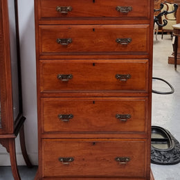 Lovely Antique English walnut tallboy/ chest of drawers. There are five drawers which all differ in sizes and have lovely hardware. It is in good original detailed condition.
