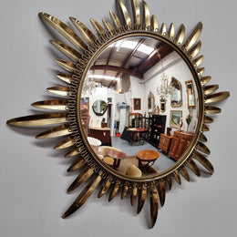 Stunning Vintage starburst convex mirror. It has been sourced from France and in good original detailed condition.