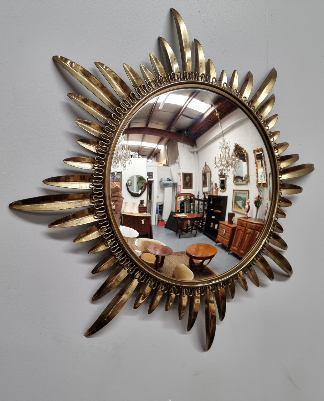 Stunning Vintage starburst convex mirror. It has been sourced from France and in good original detailed condition.