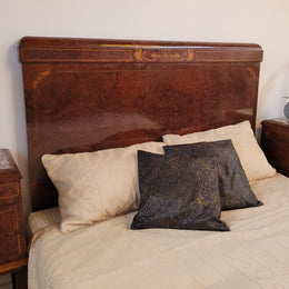 French Art Deco bedroom suite consisting of queen size bed in Amboyna wood and featuring pretty inlay. It comes with a matching pair of bedsides. It is a very stylish and high quality suite. It has been sourced from France and is in good original detailed condition.