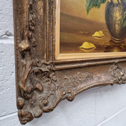 French signed oil on canvas depicting sunflowers in an attractive gilt frame. It is in good original detailed condition and has been sourced from France.