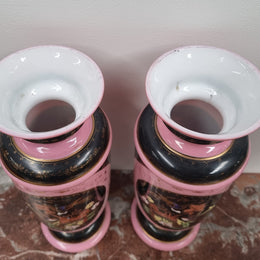 Late Victorian pink and hand painted, enameled pair of vases with some ware to enameling. It is in good original condition.