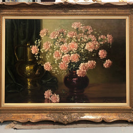 A signed oil on canvas painting of Carnations flowers in an ornate gilt original frame. Circa 1900's in good original condition.