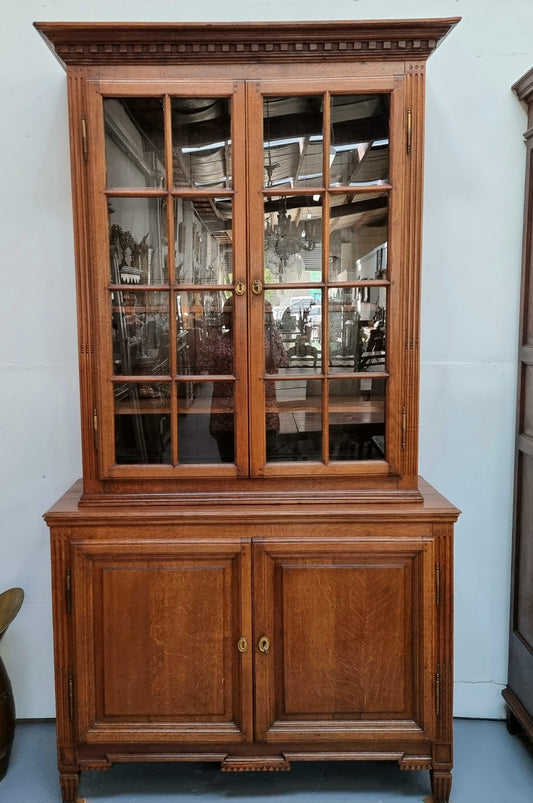 Beautiful 19th Century French Oak four door bookcase with 3 adjustable shelves and 1 fixed shelf in good detailed original condition.