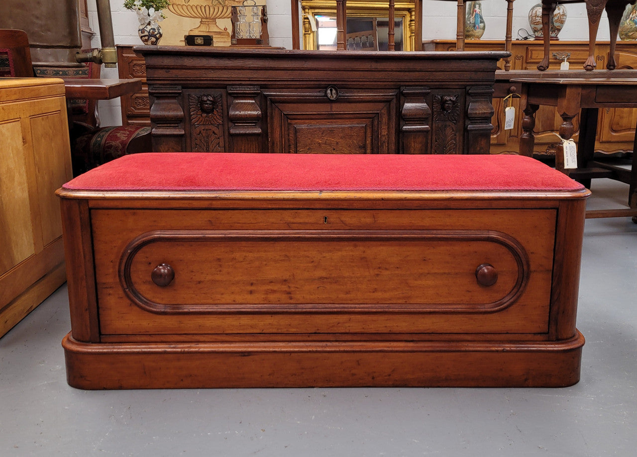 Victorian Cedar blanket box seat with lovely upholstery. This beautiful seat could be used in a bedroom in front of a bed or a hallway to store shoes and sit on when putting them on. It is in good original condition, please view photos as they help form part of the description.