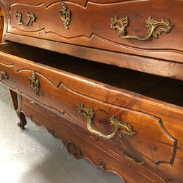 Beautiful 18th Century French all Cherrywood three drawer commode with beautiful ormolu mounts and handles. It is in good original detailed condition.