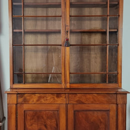 Rare early Australian colonial full Cedar bookcase. Plenty of storage underneath and glass top doors open up too three fully adjustable shelves. In good restored condition.
