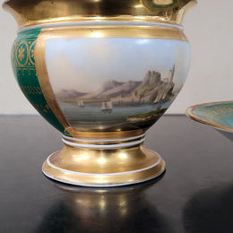 “Old Paris Porcelain” large cup and saucer with hand painted river landscape featuring castles. Gilt and enamel decoration. Circa: early 19th Century. In good original condition please view photos as they help form part of description.