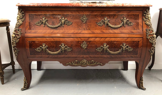 Grande French Louis XIV style Amboyna and walnut two drawer marble top commode, with amazing detailed ormolu mounts, and sienna colour marble top. In good original detailed condition.