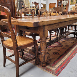 Large impressive 19th century 2.5 meter Antique French Oak farmhouse table. Loads of character with a stunning solid thick top and has a long drawer at one end. Sourced from France and in good original detailed condition.