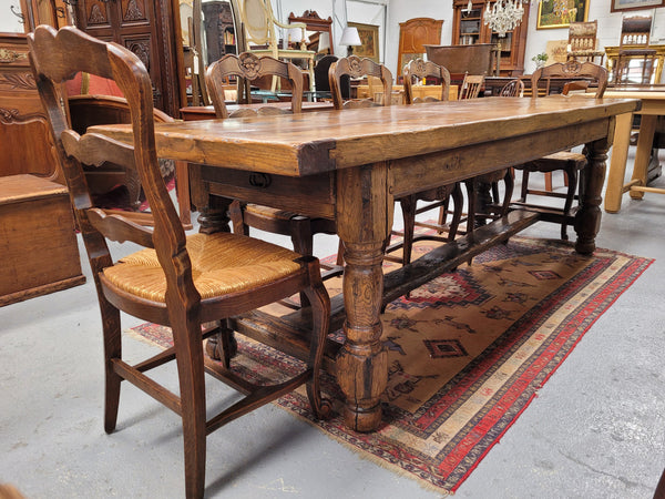 Large impressive 19th century 2.5 meter Antique French Oak farmhouse table. Loads of character with a stunning solid thick top and has a long drawer at one end. Sourced from France and in good original detailed condition.