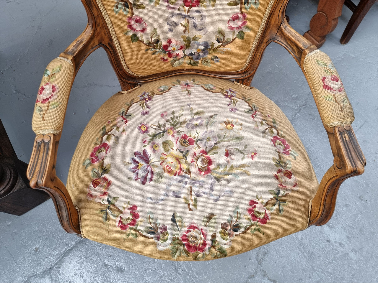 Louis XV style Walnut and tapestry armchair. Very comfortable to sit in and tapestry is in good original used condition.