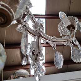 Sourced From France an attractive eight arm French crystal chandelier. It has been fully rewired to Australian standards and is in good original working condition.