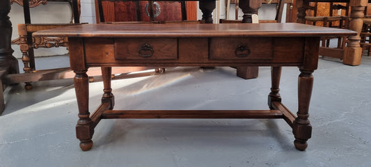 Beautiful French oak 2 drawer coffee table. In good original detailed condition.