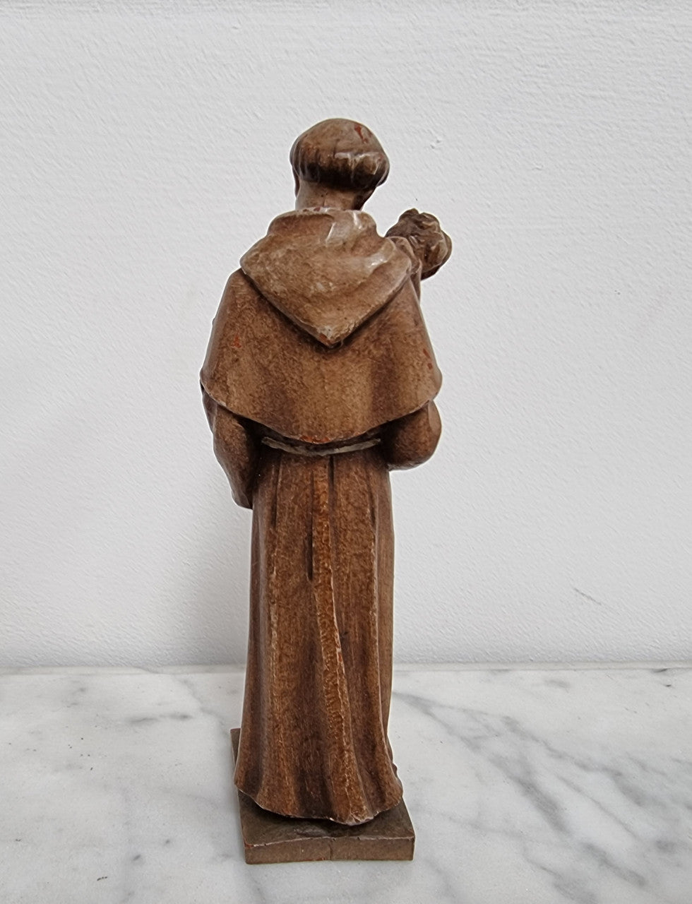 Vintage wood carved St. Anthony and baby Jesus statuette. Hand painted and is in good detailed condition.