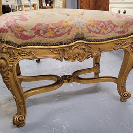 Charming 19th Century gilt wood tapestry covered Louis XV style stool. It has a beautifully carved base and undercarriage and it has been sourced from France. It is in good original detailed condition, please view photos of tapestry has they help form part of the description.